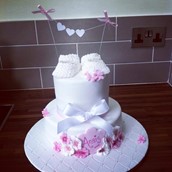 Floral booties christening cake - licky lips cakes liverpool